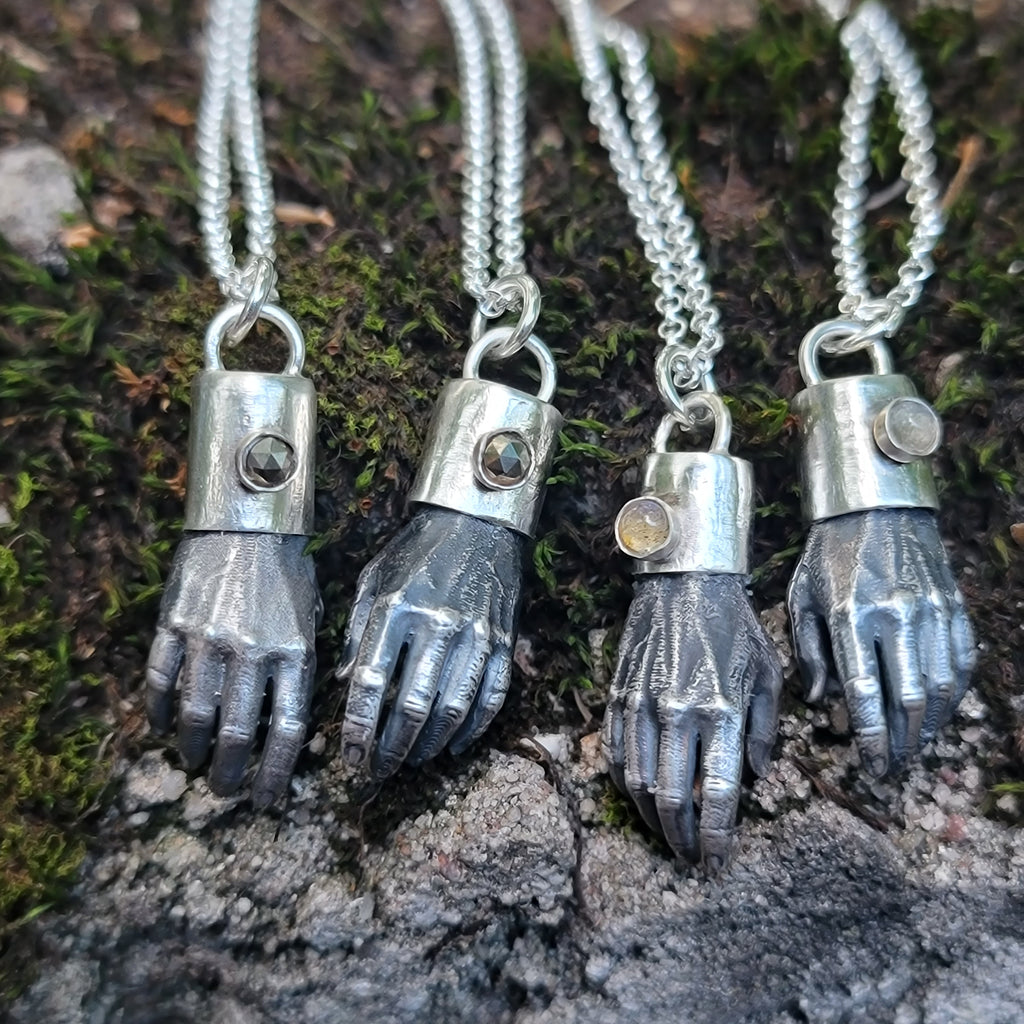 Man Hands Pendants in Solid Sterling Silver with Gemstone Caps