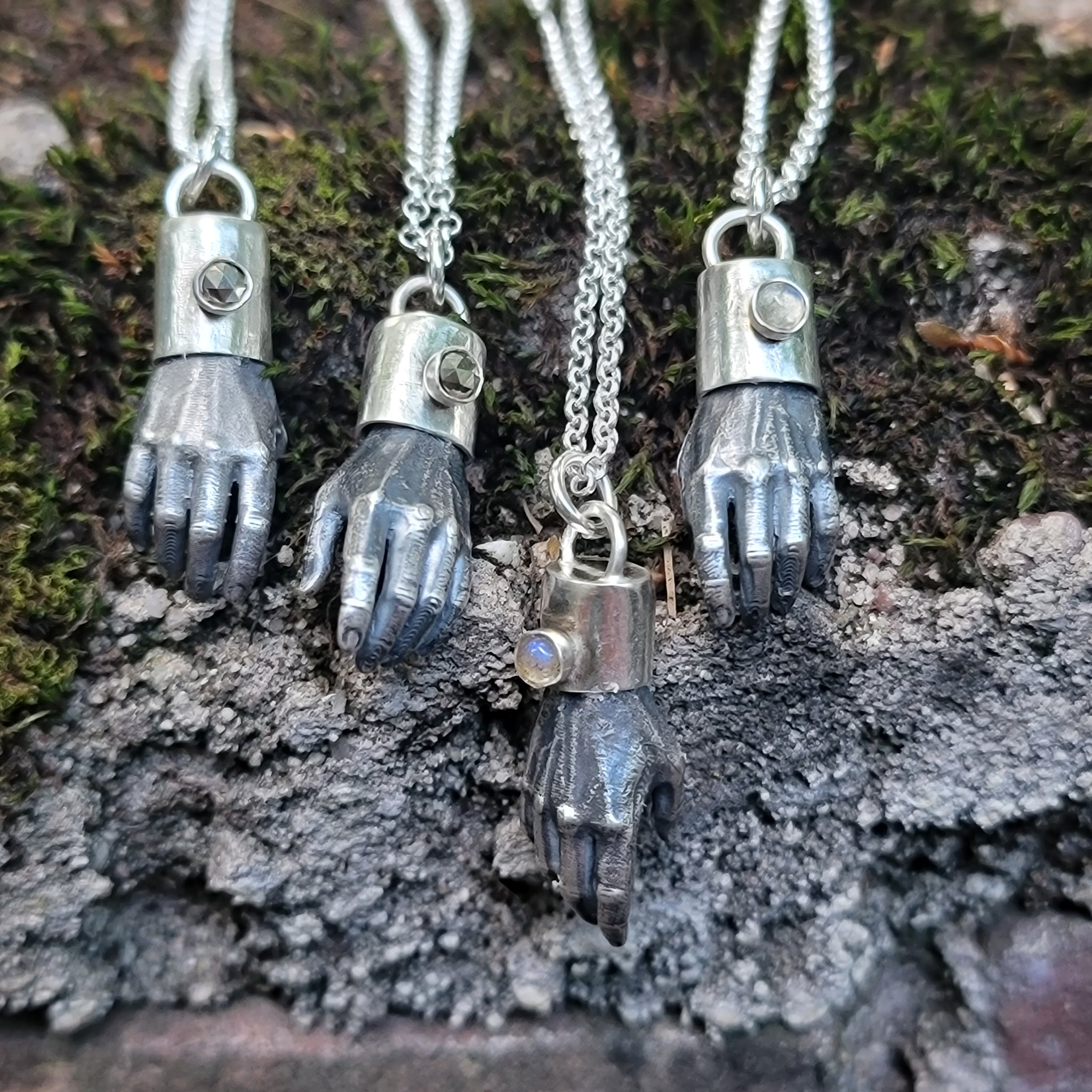 Man Hands Pendants in Solid Sterling Silver with Gemstone Caps