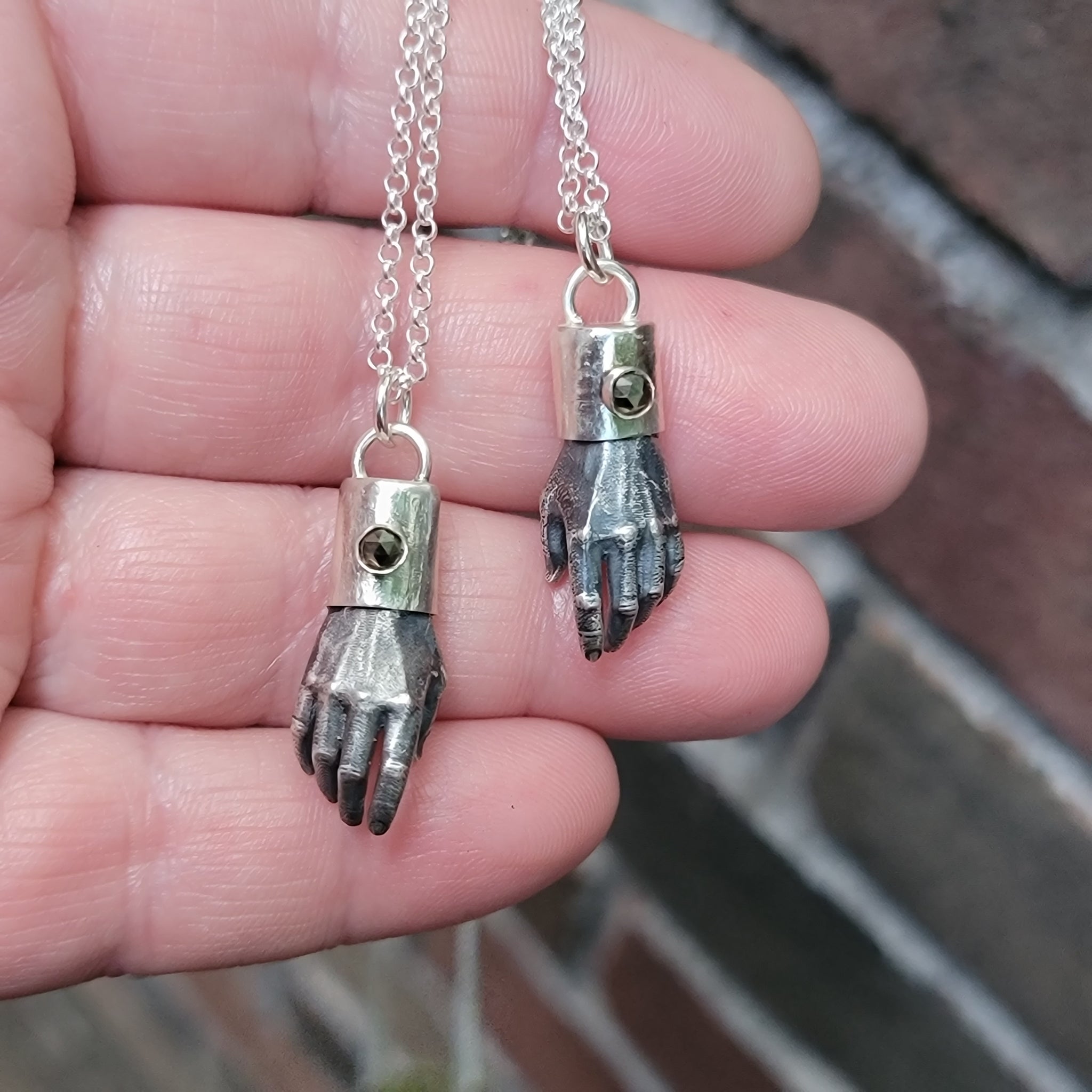 Man Hands Pendants in Solid Sterling Silver with Gemstone Caps