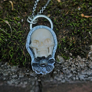 Pushing Up Daisies Carved Skull Pendant in Sterling Silver