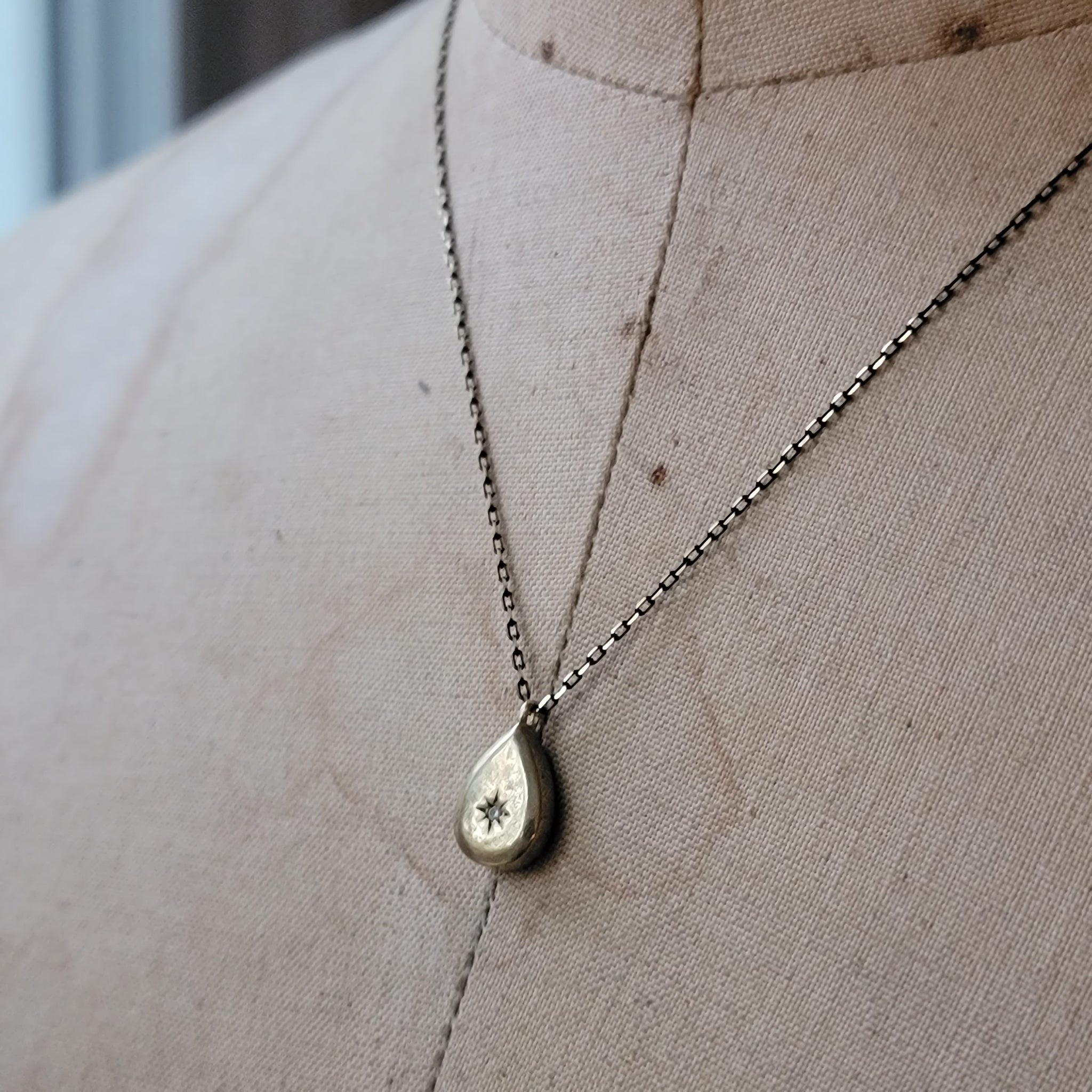 Sparkly Zircon & Brass Teardrop Pendant