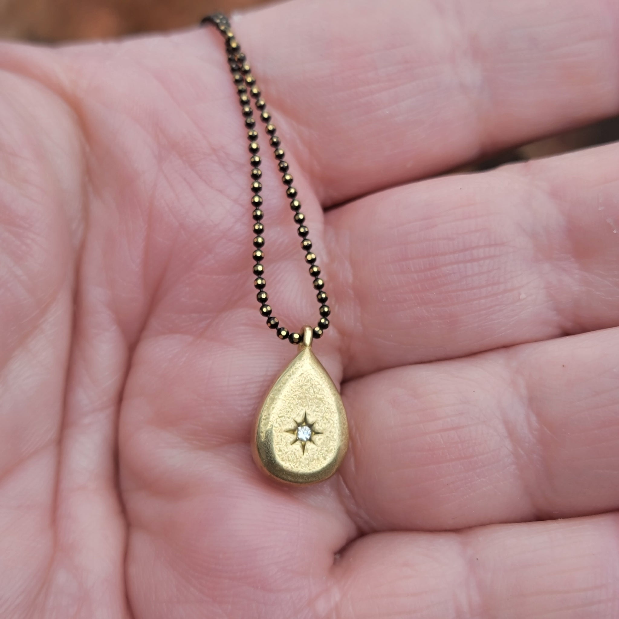 Sparkly Zircon & Brass Teardrop Pendant