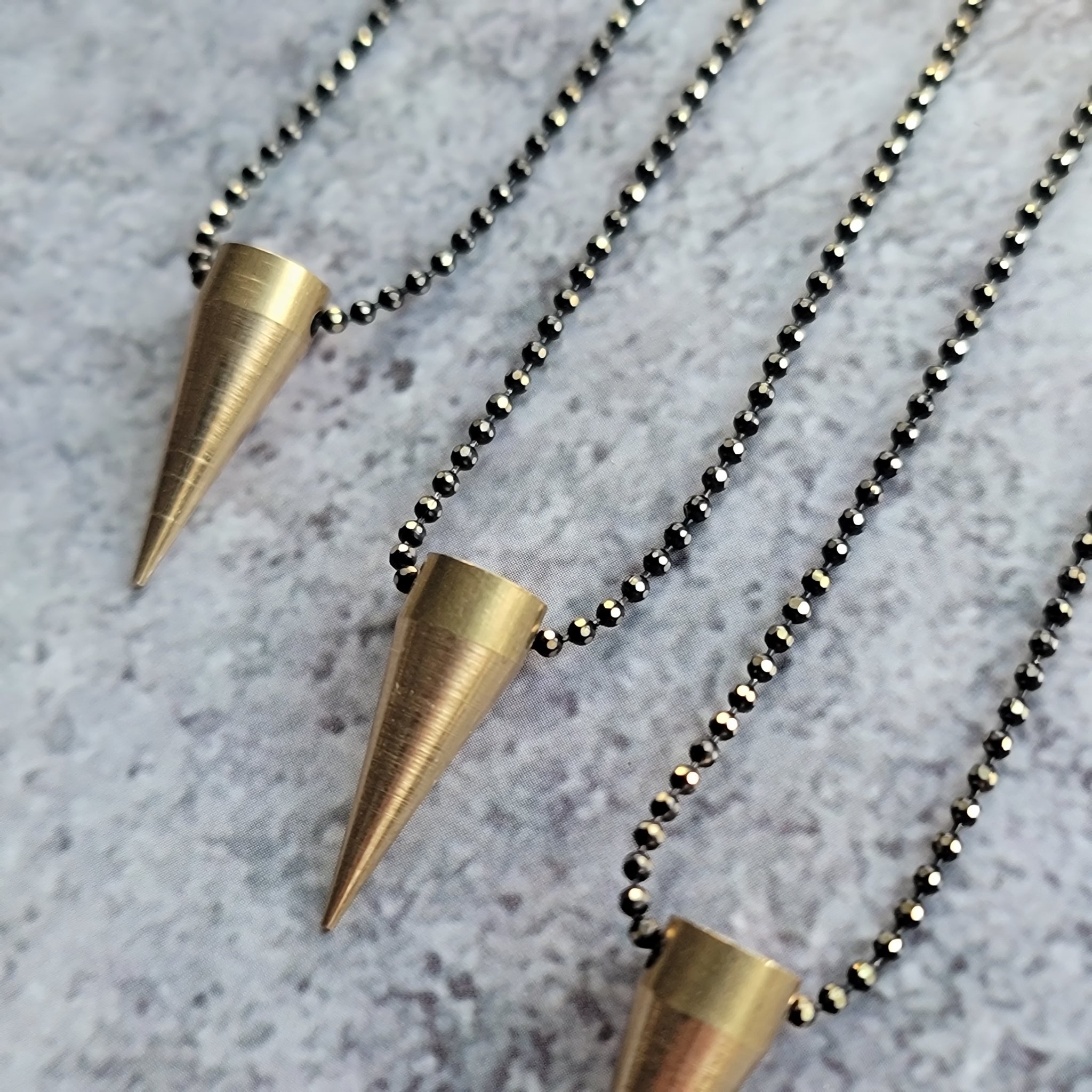 Brass Spike Pendulum Pendant