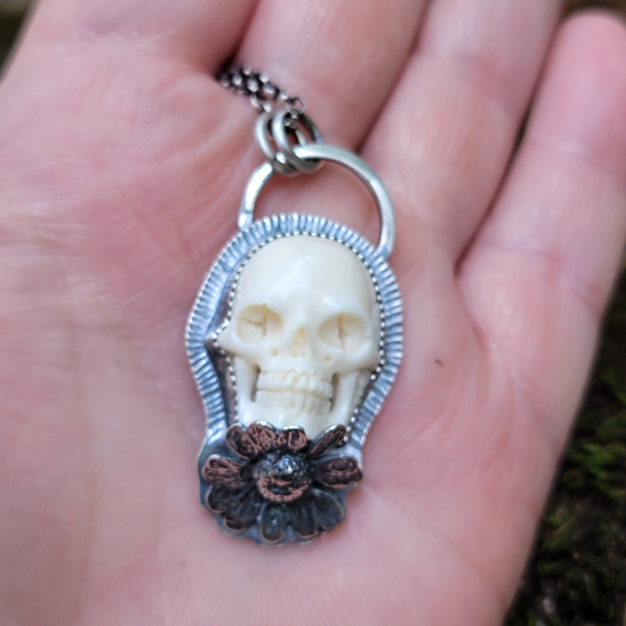 Pushing Up Daisies Carved Skull Pendant in Sterling Silver