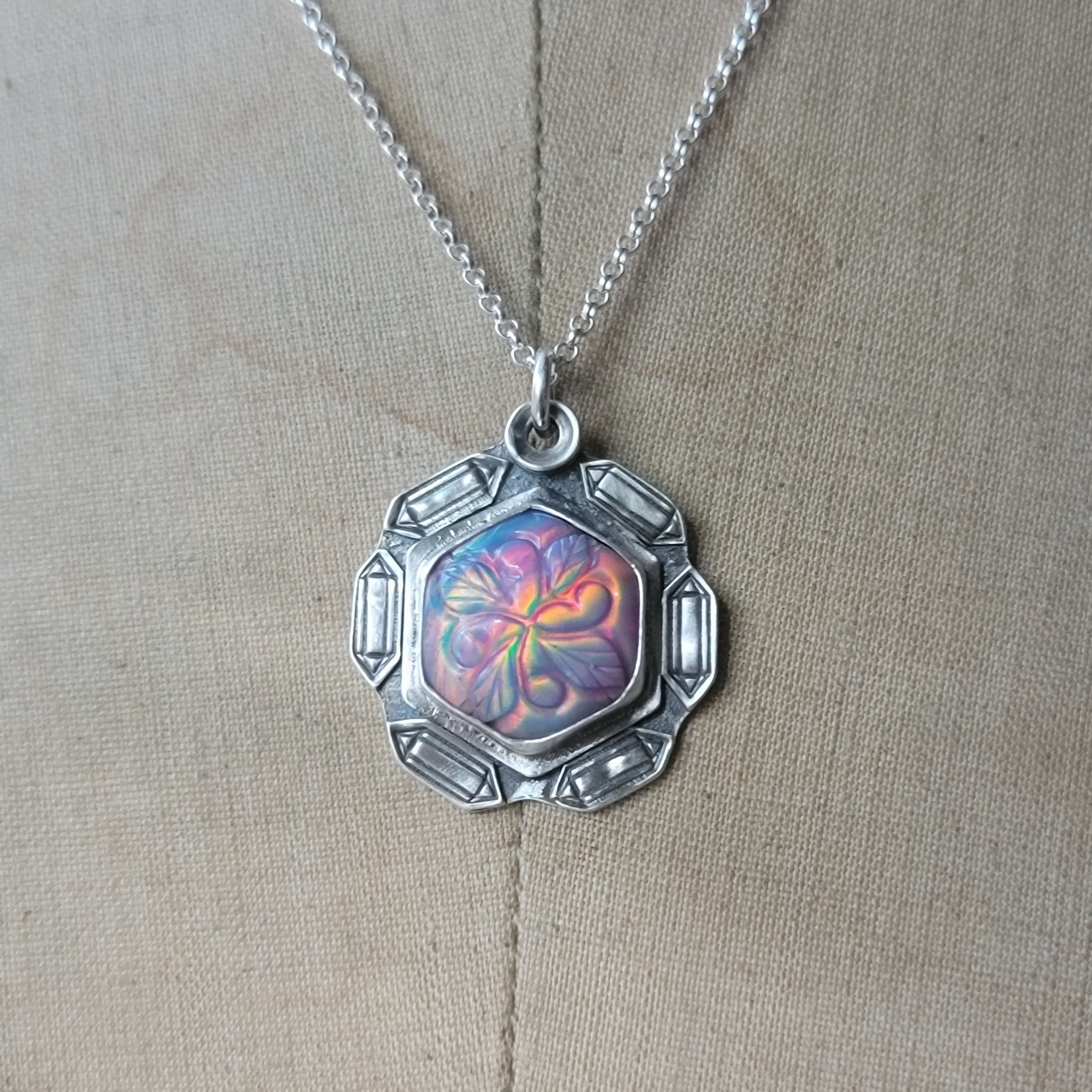 Carved Opal Pendant with Crystal Points Border in Sterling Silver