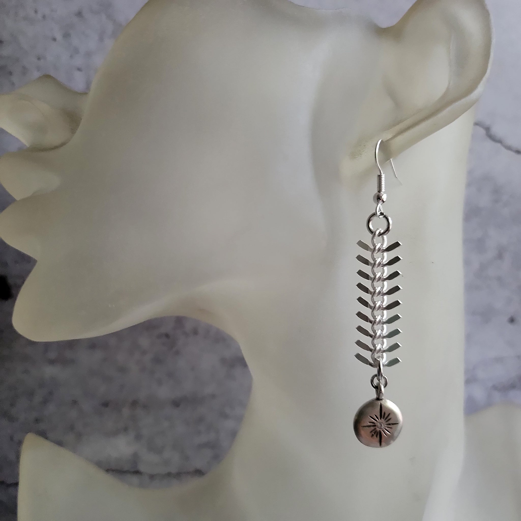 Silver Star Shine Fish Bone Dangle Earrings